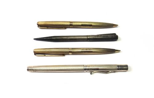 A Yard o Led silver fountain pen, circa 2009, a vintage Yard o Led silver propelling pencil and two Parker 9ct gold propelling pencils, with engine tu