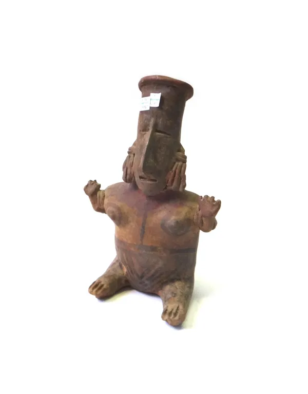 A group of Pre-Columbian and other terracotta figures and masks, the largest 30cm high, (11) with display board.