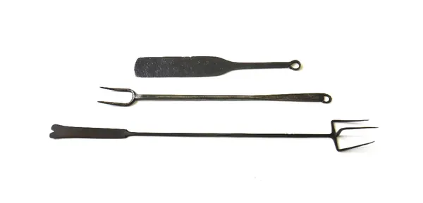 A wrought iron two pronged cooking fork, 18th/19th century, stamped 'B' to the handle, 52cm, together with another longer three pronged fork and a spa