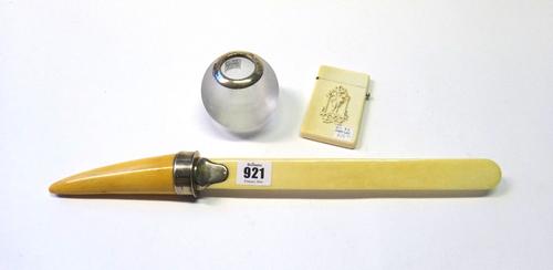 A Victorian ivory and silver mounted page turner, 41cm, a glass and silver mounted match striker of spherical form, 6.5cm high, and a Victorian ivory