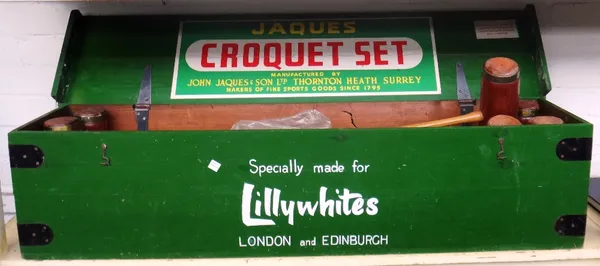 A Jaques croquet set from Lillywhites of London, comprising six mallets, iron hoops, coloured balls and instructions, boxed.