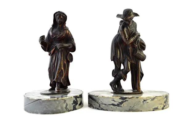A pair of Italo-Flemish bronze figures of a woman and a pedler, the later after Giambolgna, each on an oval grey vein marble base, 15cm high. (2)  Ill