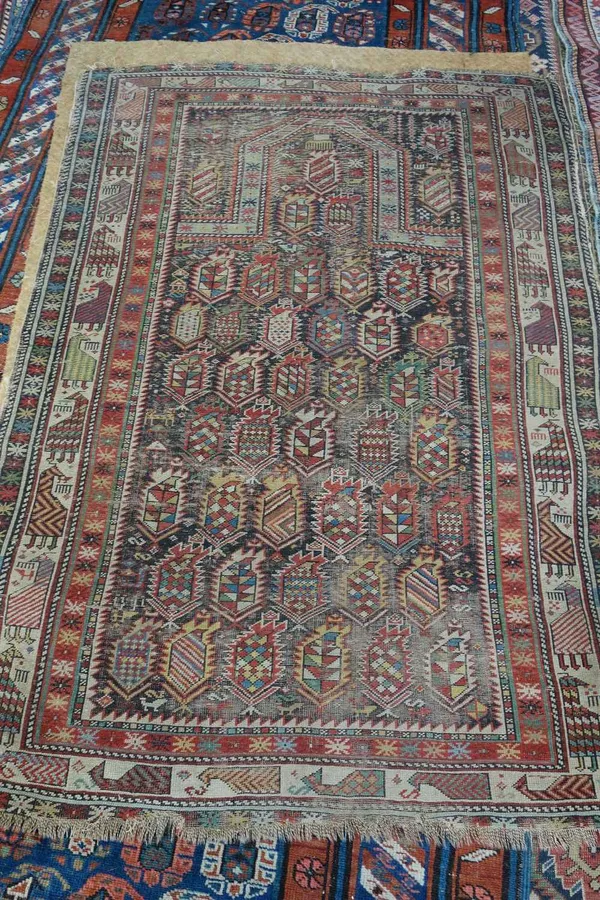 A Marasali prayer rug, Caucasian,  the black mehrab filled with serrated polychrome botehs, with a matching arch above and an ivory bird border, 147cm