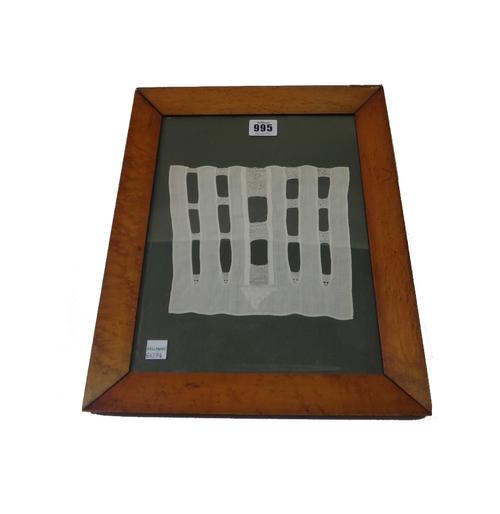 A child's bodice worked with hearts and a crown, dated 17**, in a burr maple glazed frame.