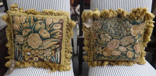 A group of eight cushions made from 17th century verdure tapestry fragments. (8)