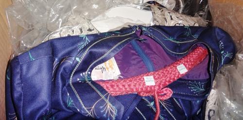 A quantity of vintage dresses and clothing.