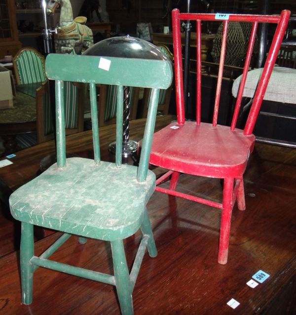 A red painted child's chair, a green painted child's chair and a Helena Christensen lamp.