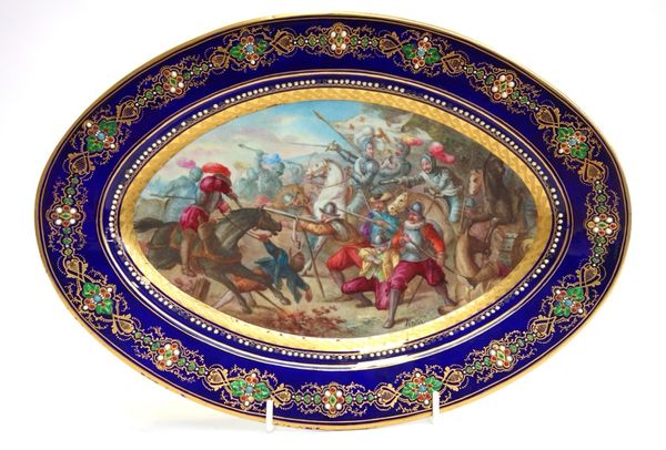 A Sevres style oval porcelain dish, late 19th century, detailed to the reverse 'Bataille de Coutras, 1587', with Sevres mark, painted with titled batt