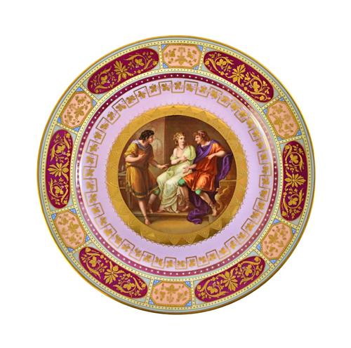 A Vienna style charger, late 19th century, decorated with classical figures and signed 'Ed Barschneieler' within a gilt floral multicoloured wide bord