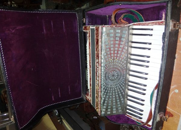 An early 20th century SOPRANI accordion.