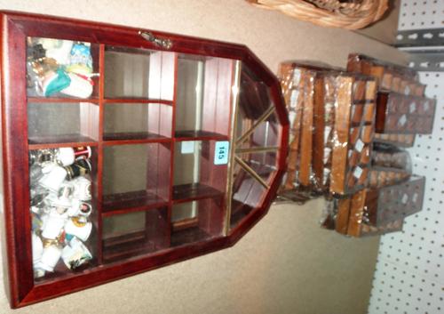 A large quantity of thimbles, (200 plus), mainly ceramic and display cases.