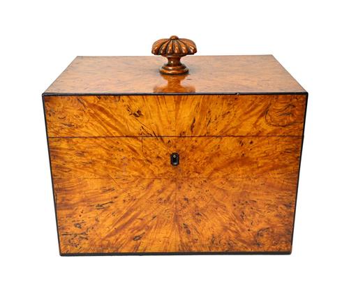 A 19th century satinwood decanter box, the rectangular lid revealing a six division interior, 29cm wide.  Illustrated