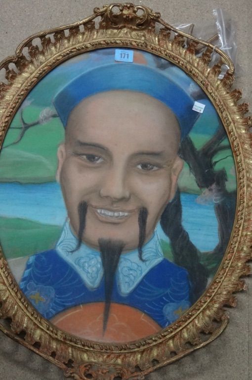 A pastel head study of an Oriental man, oval.