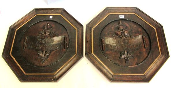 A pair of 19th century French carved oak panels in octagonal frames, 53cm wide.