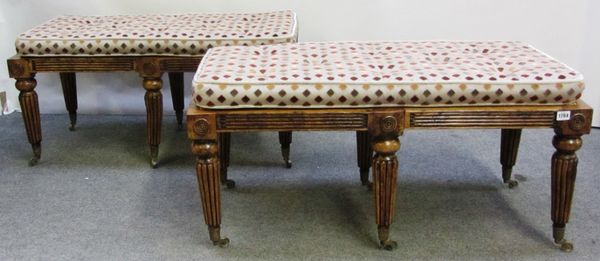 A pair of oak framed rectangular window seats, each on six tapering reeded supports, 99cm wide.