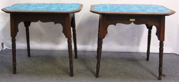 A pair of late 19th century mahogany framed canted rectangular occasional tables, with inset tiled tops, 84cm x 53cm.