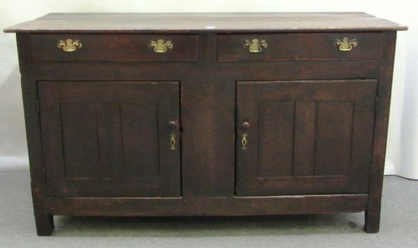 An 18th century oak dresser base, with pair of drawers over cupboards on block supports, 160cm wide.