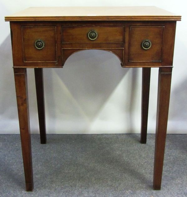 A George III mahogany lowboy, with three frieze drawers, on tapering square supports, 64cm wide.