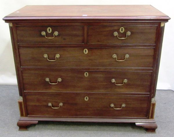 A 18th century mahogany chest of two short and three long graduated drawers, flanked by split fluted columns on ogee bracket feet, 120cm wide.