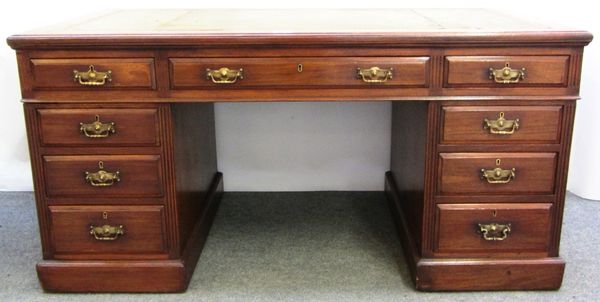 An 18th century style mahogany pedestal desk with nine drawers about the knee, 154cm wide.