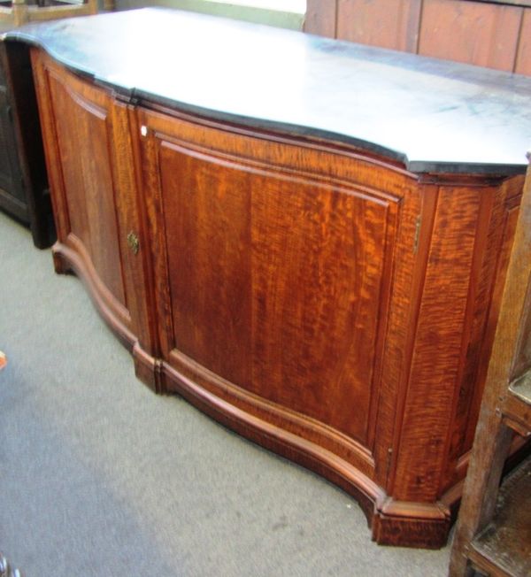 A large 19th century side cabinet, the serpentine slate top with outstepped corners, over a sycamore two door base resting on a plinth, 201cm wide.
