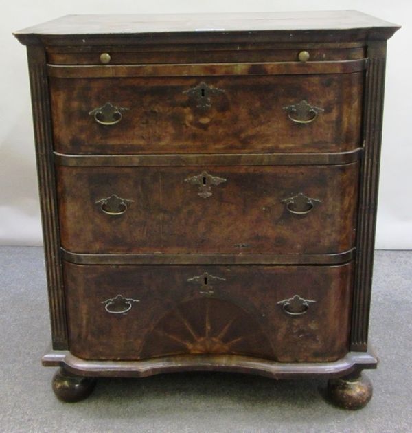 An 18th century style Continental figured walnut chest, the brushing slide over three long bow front drawers, the lower with concave stellar inlay, on