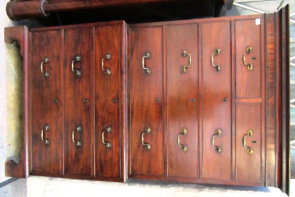 A George III mahogany chest on chest, with two short and six long graduated drawers, on bracket feet, 105cm wide x 180cm high.
