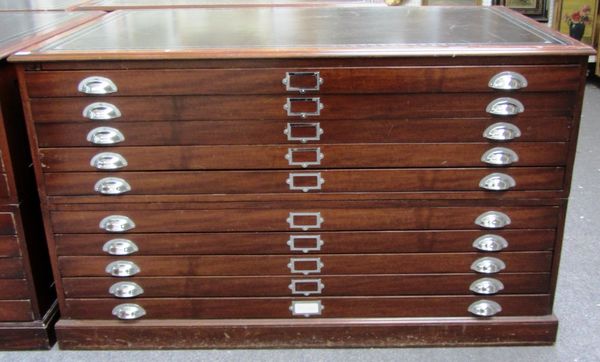 A mid 20th century mahogany two part plan chest, with tool inset leather top over ten drawers, on plinth base, 148cm wide.