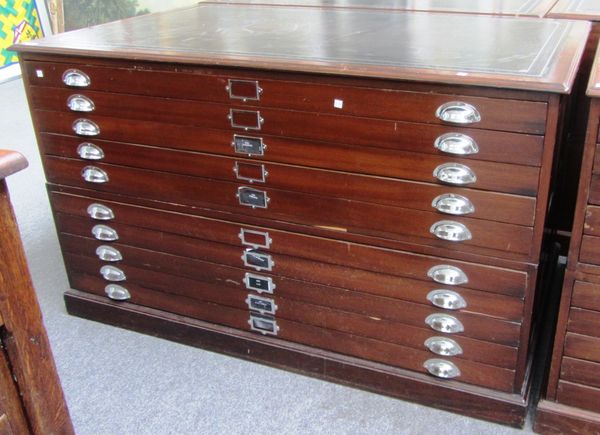 A mid 20th century mahogany two part plan chest, with tool inset leather top over ten drawers, on plinth base, 150cm wide.