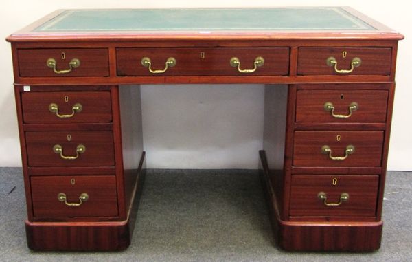 A 19th century mahogany pedestal desk, with nine drawers about the knee on plinth base, 123cm wide.