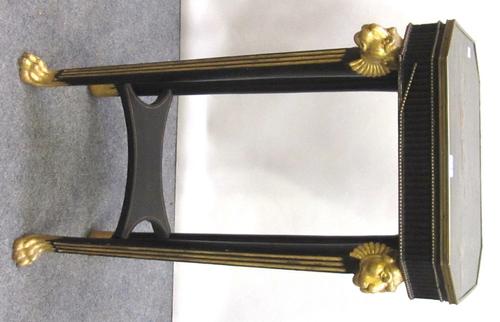 An 18th century and later occasional table, the canted rectangular chinoiserie decorated top on a parcel gilt ebonised base, with four lions mask capp