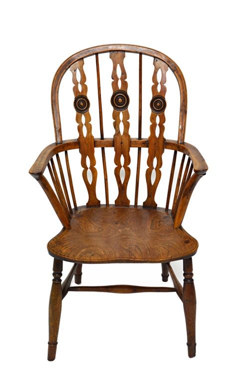 A George III yew and elm bow back Windsor chair, with triple bullseye splat on turned supports united by 'H' frame stretcher.  Illustrated