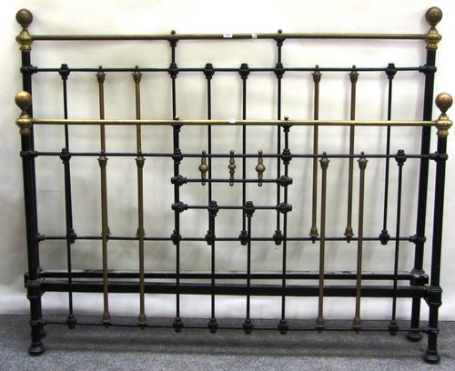 A Victorian style brass and black painted double bed with sphere finial decoration, 155cm wide.