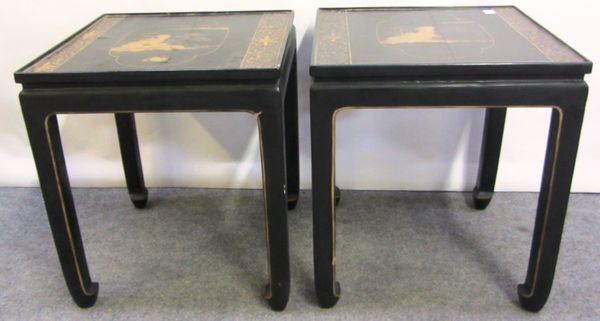 A pair of 20th century Chinese black lacquer chinoiserie decorated occasional tables on block supports, 48cm wide.
