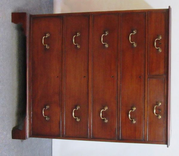 A George III mahogany chest of two short and four long graduated drawers, on bracket feet, 105cm wide.