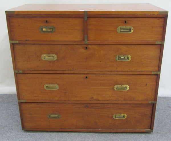 A mid 19th century brass bound teak campaign chest of two short and three long graduated drawers, 107cm wide.