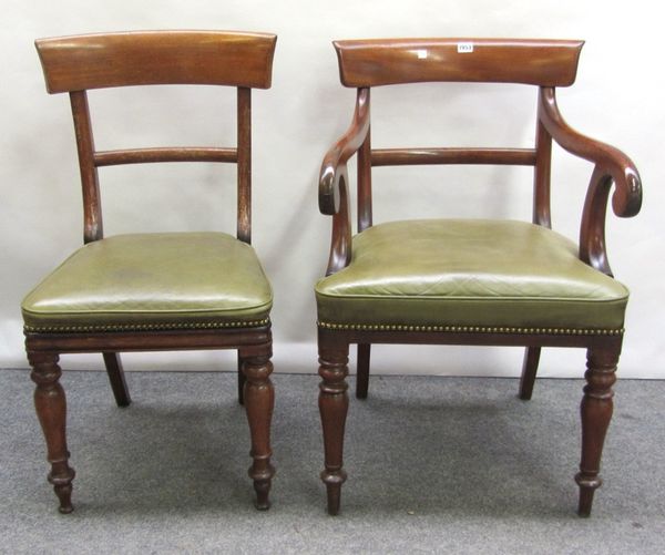 A set of eight Victorian mahogany framed dining chairs on turned front supports, to include a pair of carvers (8).