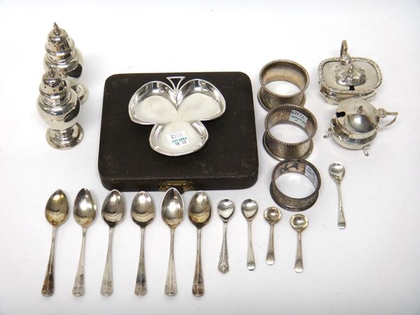 Silver, comprising; a set of six coffee spoons, Sheffield 1931, cased, a pair of baluster shaped pepperettes, London probably 1905, two mustard pots,