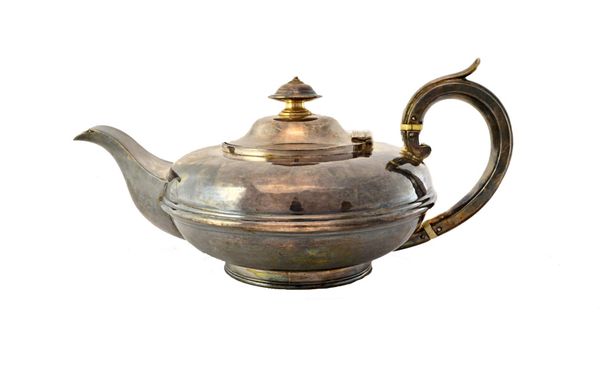 A William IV silver teapot, of squat circular form, on a reeded circular foot, London 1831, gross weight 603 gms.  Illustrated