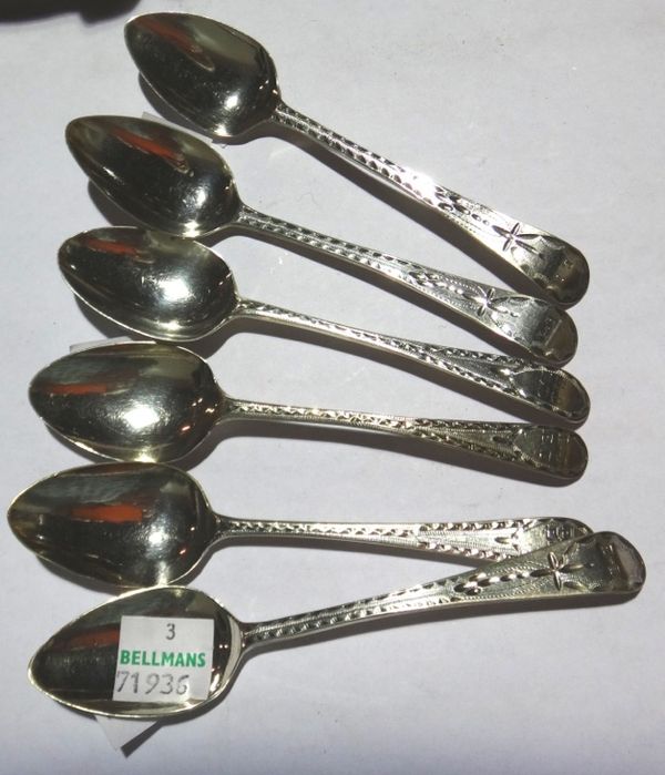 A matched set of six George III silver teaspoons, with bright cut decoration.