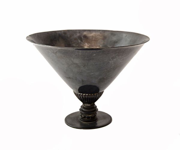 A Georg Jensen Sterling silver bowl, of flared circular form, with a decorated stem and on a plain circular foot, detailed Georg Jensen Desin Denmark