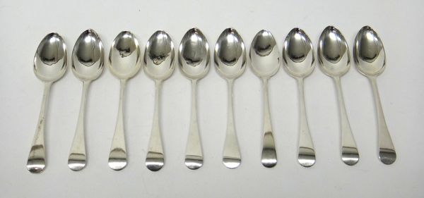 Ten silver Old English pattern dessert spoons, comprising; nine London 1818 and one London 1808, combined weight 374 gms.