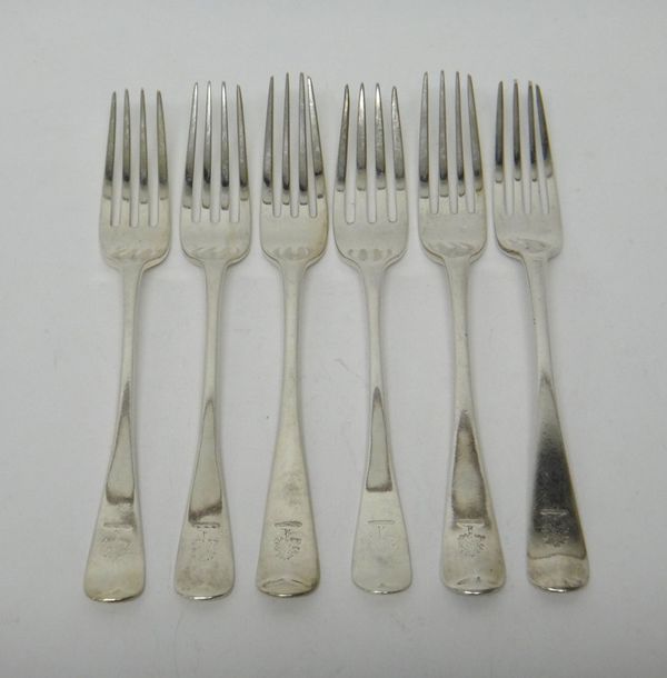 Six silver Old English pattern table forks, including three London 1868, combined weight 358 gms.