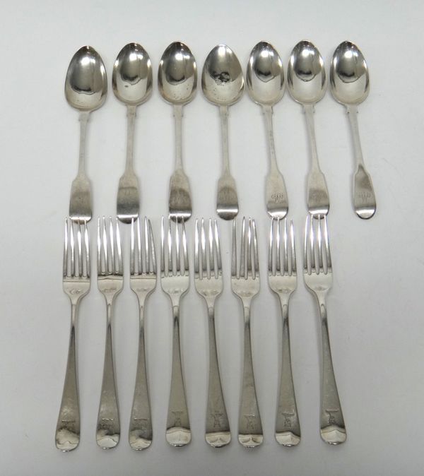 Eight silver Old English pattern dessert forks, comprising; three London 1801, three London 1825 and two London 1848 and seven silver fiddle pattern d