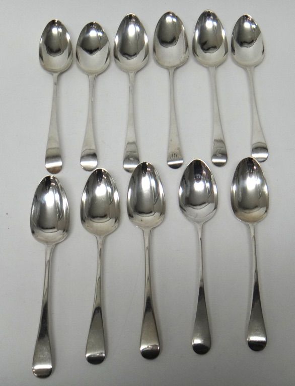 Eleven silver Old English pattern tablespoons, comprising; three London 1799, three London 1793, two London 1791 and three various dates, combined wei