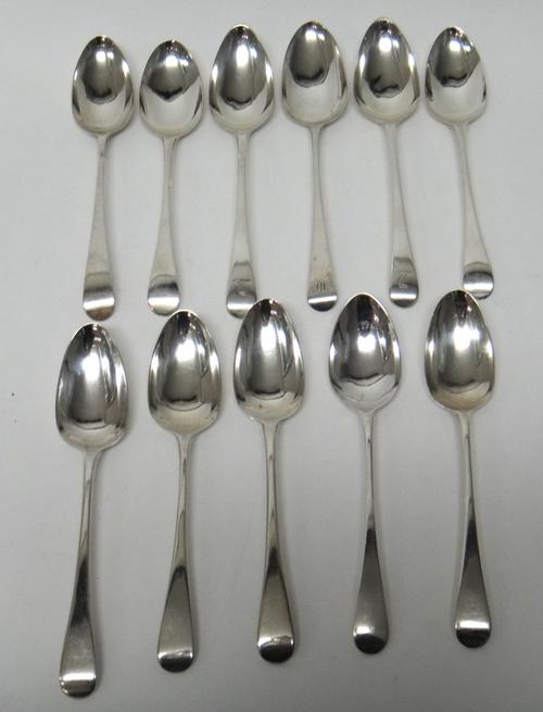 Eleven silver Old English pattern tablespoons, comprising; three London 1799, three London 1793, two London 1791 and three various dates, combined wei