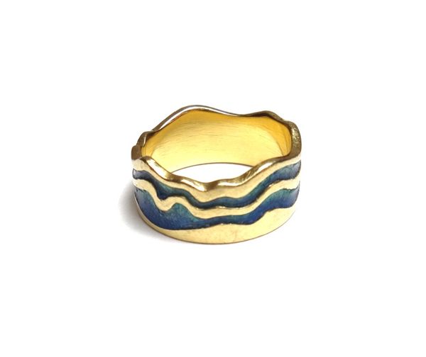 An 18ct gold and blue/green enamelled wide band ring, decorated with two undulating enamelled bands, by Sheila Fleet, Orkney, ring size U and a half,