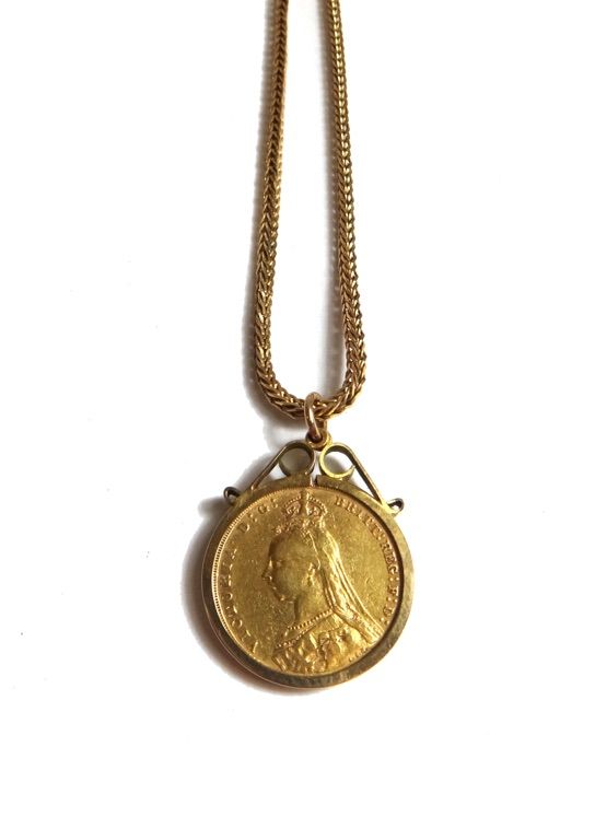 A Victoria Jubilee head sovereign 1891 M, in a 9ct gold pendant mount, on a 9ct gold woven link neckchain, with a boltring clasp, combined weight 17 g