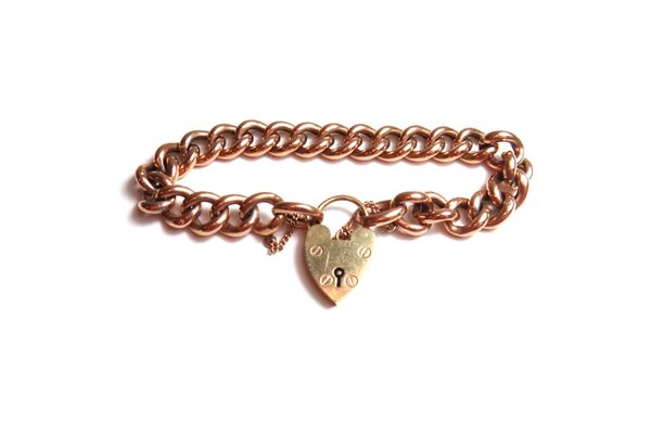 A gold hollow curb link bracelet, on a later 9ct gold heart shaped padlock clasp, weight 18 gms.