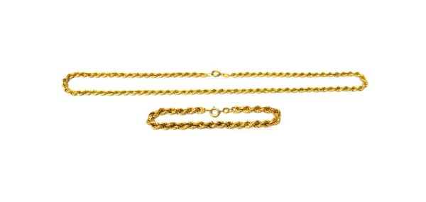 A gold, ropetwist link neckchain, on a boltring clasp and a gold ropetwist link bracelet, on a boltring clasp, each chain detailed K 18, the two clasp